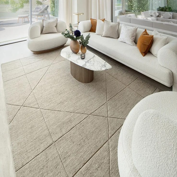 Neutral tone carpet flooring styled in a modern lounge