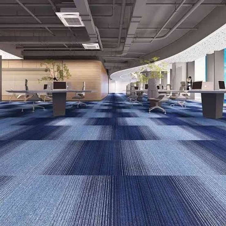 Blue carpet tile flooring installed in a modern office