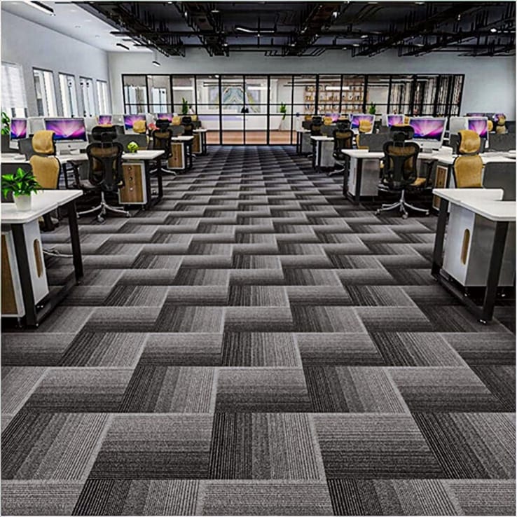 Dark grey carpet tile flooring in an open-plan office