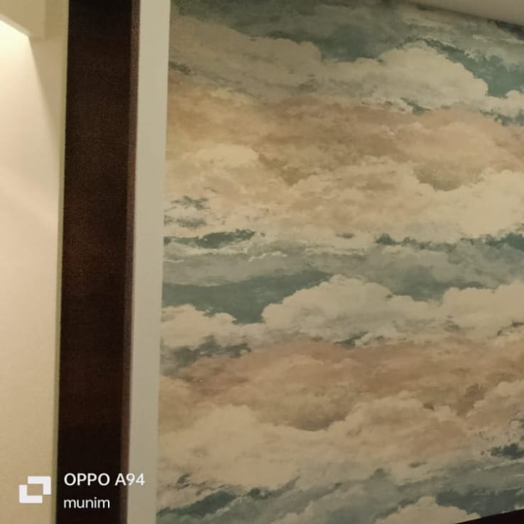 Magnolia branch wallpaper with backlit frame accent