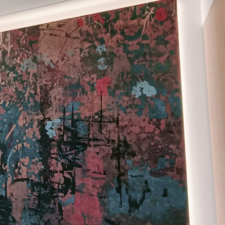 Multi-colour floral wallpaper feature wall