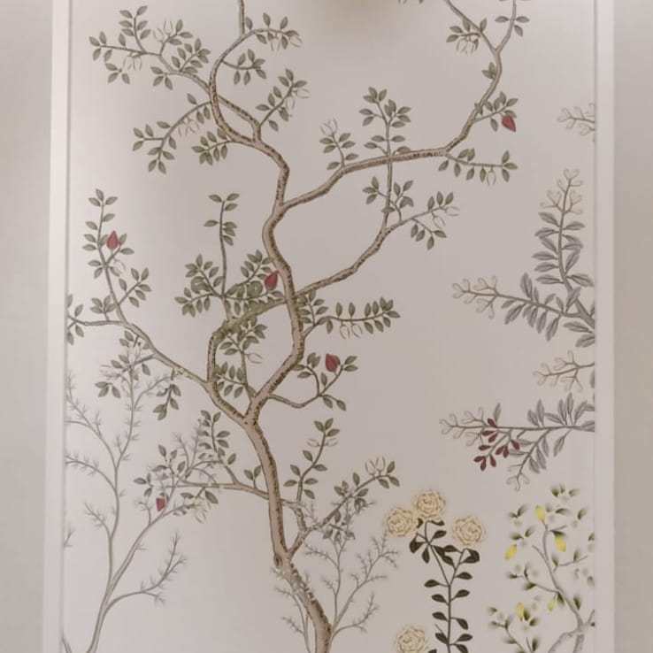 Damask-pattern wallpaper installed in an arched wall niche